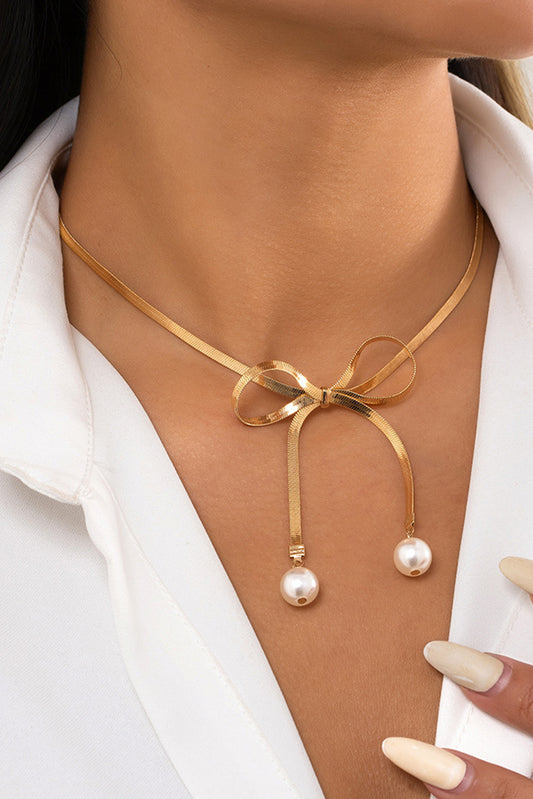 Gold Pearly Bow Necklace