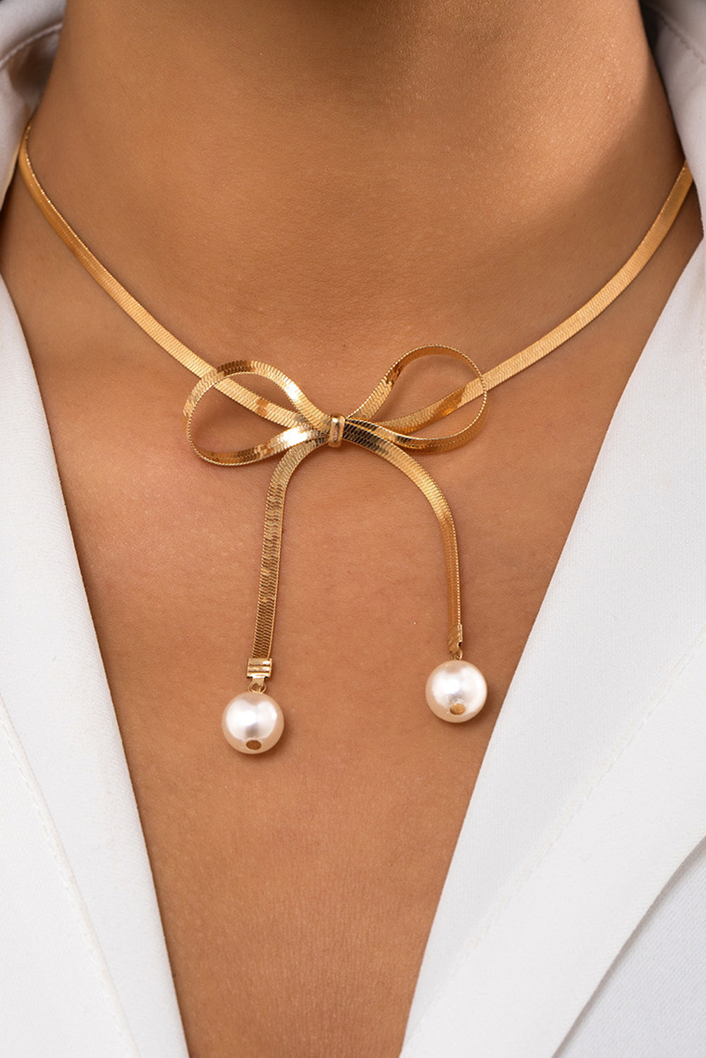 Gold Pearly Bow Necklace